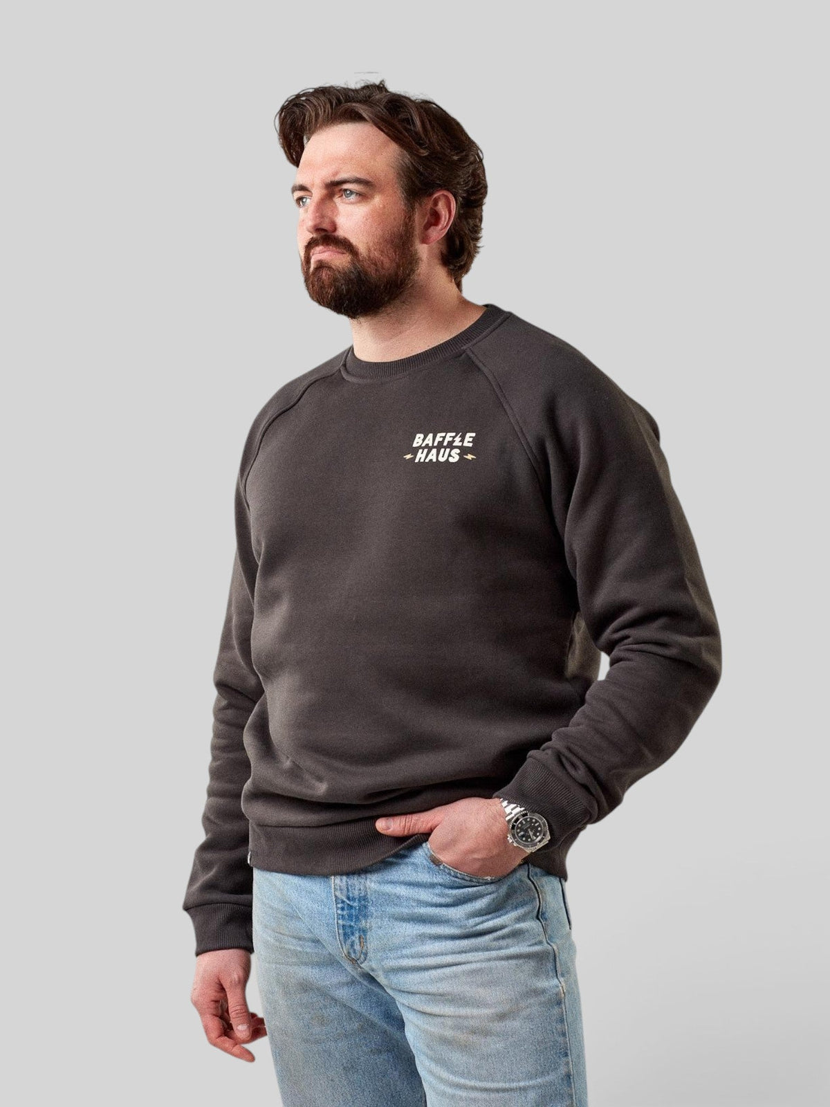 Baffle Haus Coffee & Motors sweatshirt in printers ink grey, featuring a crew neck and small chest logo on a model.