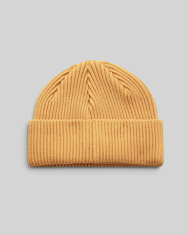 Baffle Haus radiant yellow merino wool watch cap beanie with a double fold turnover and circular knit construction.