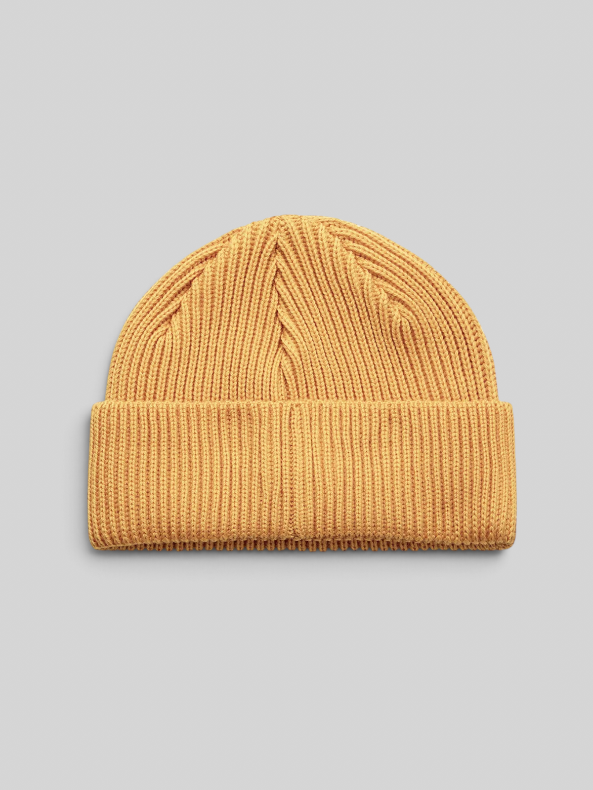 Baffle Haus radiant yellow merino wool watch cap beanie with a double fold turnover and circular knit construction.