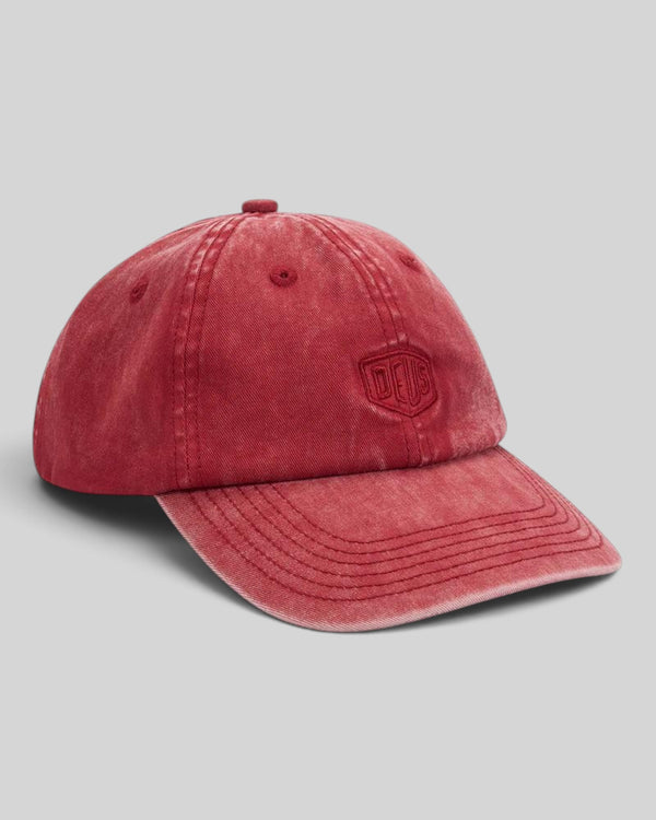 Baffle Haus Deus Shield dad cap in lava falls red cotton twill with tonal embroidered logo and enzyme stone wash