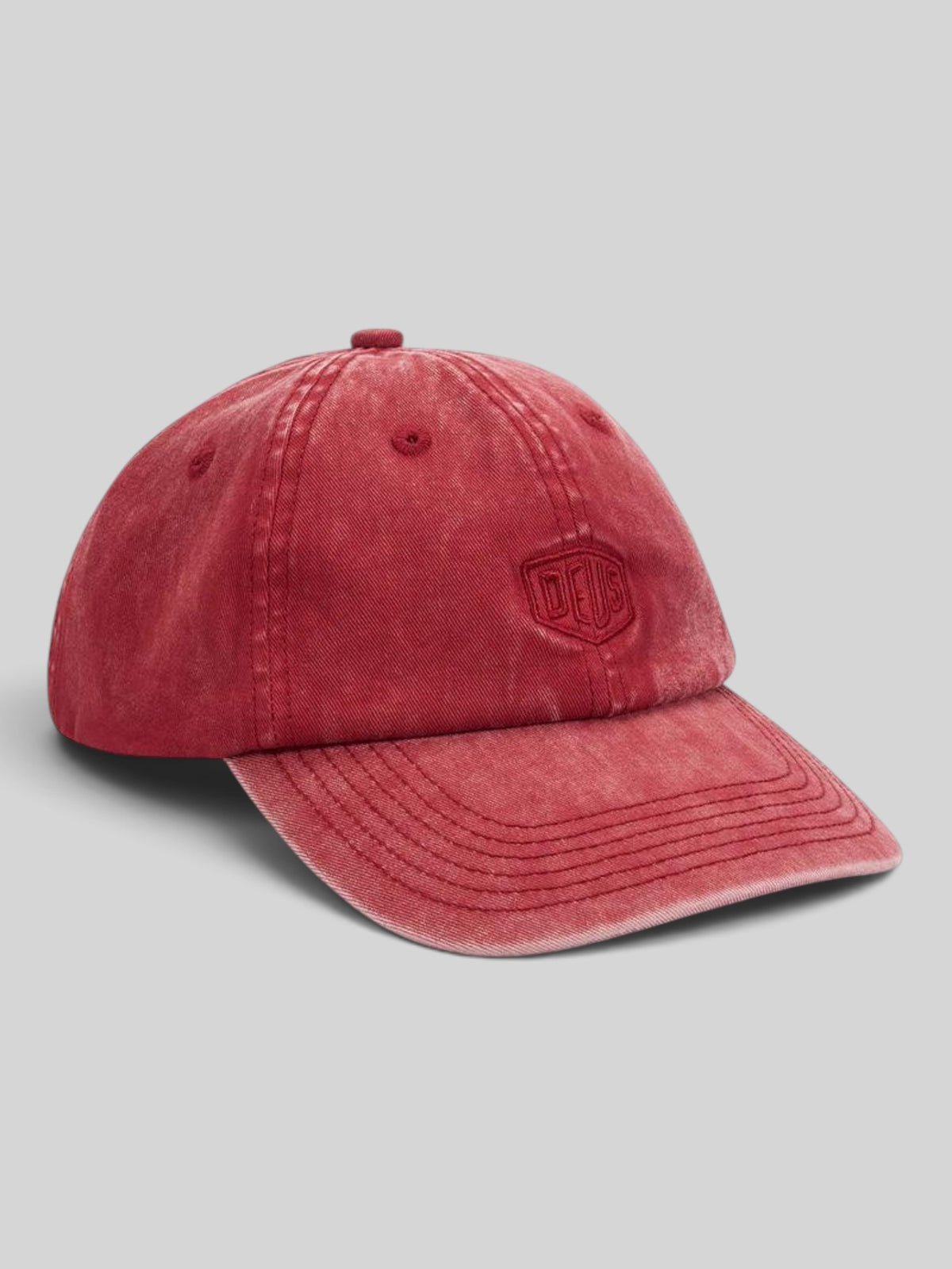 Baffle Haus Deus Shield dad cap in lava falls red cotton twill with tonal embroidered logo and enzyme stone wash