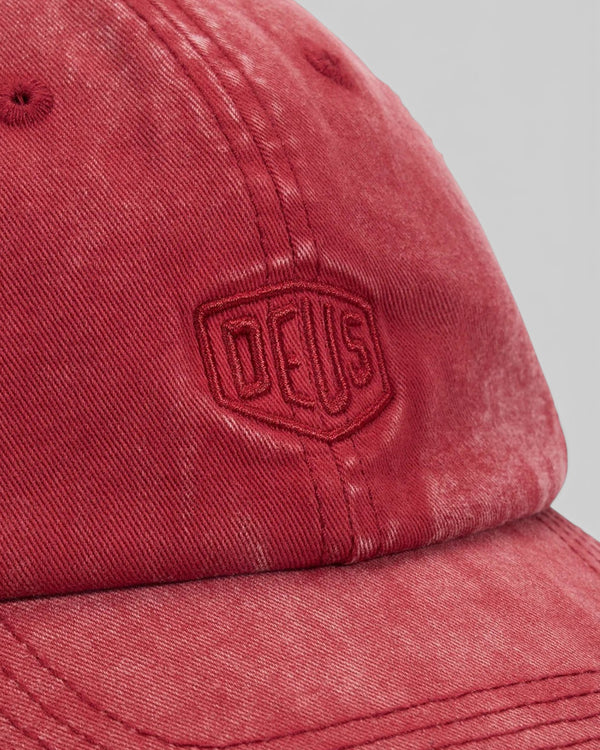 Baffle Haus Shield dad cap in lava falls red cotton twill with tonal embroidered Deus logo and enzyme stone wash