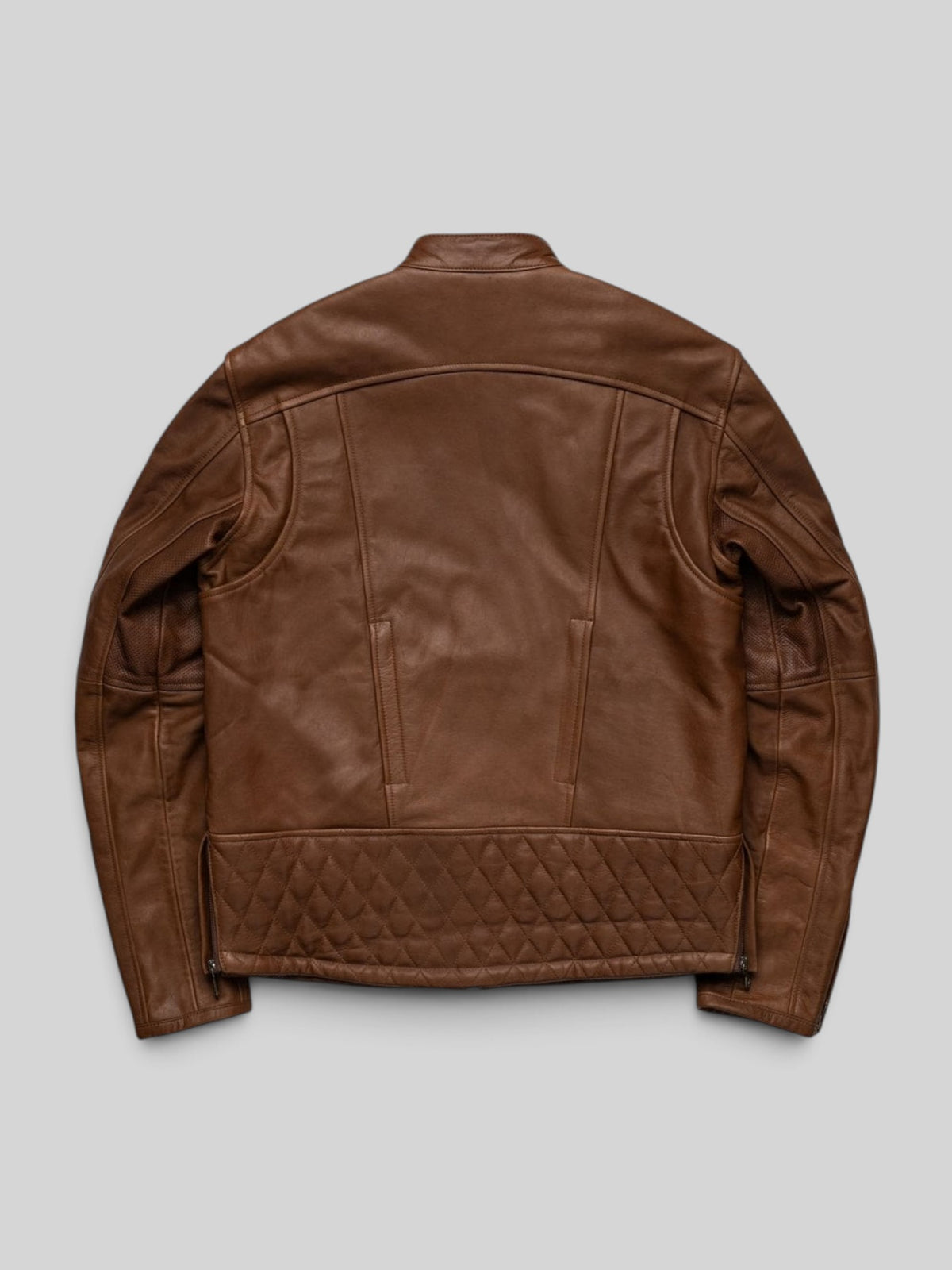 Back view of Baffle Haus Revolver tobacco leather motorcycle jacket with diamond-quilted lower panel and action back.