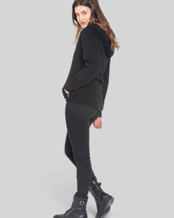 Baffle Haus Ruby black high-waisted slim-fit motorcycle jeans with stretch denim on a model wearing black boots