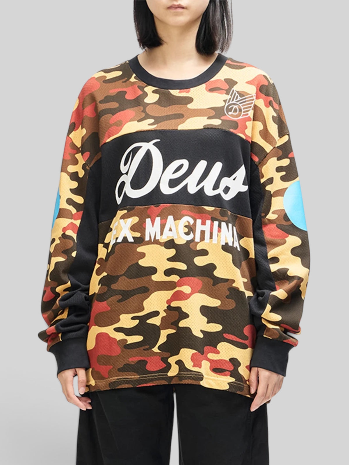 Baffle Haus rust camo ombre moto jersey with graphic chest print and loose fit recycled polyester mesh construction.