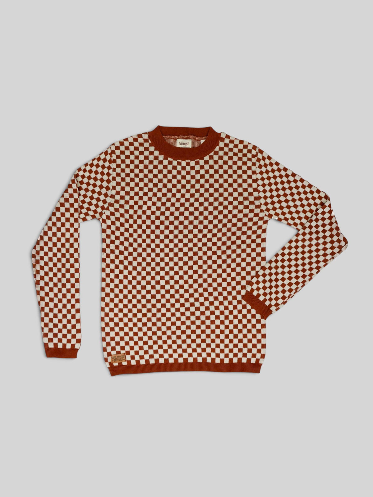 Baffle Haus rust and white chequered knit jumper with a mid-rise collar and ribbed cuffs in a vintage racing style.