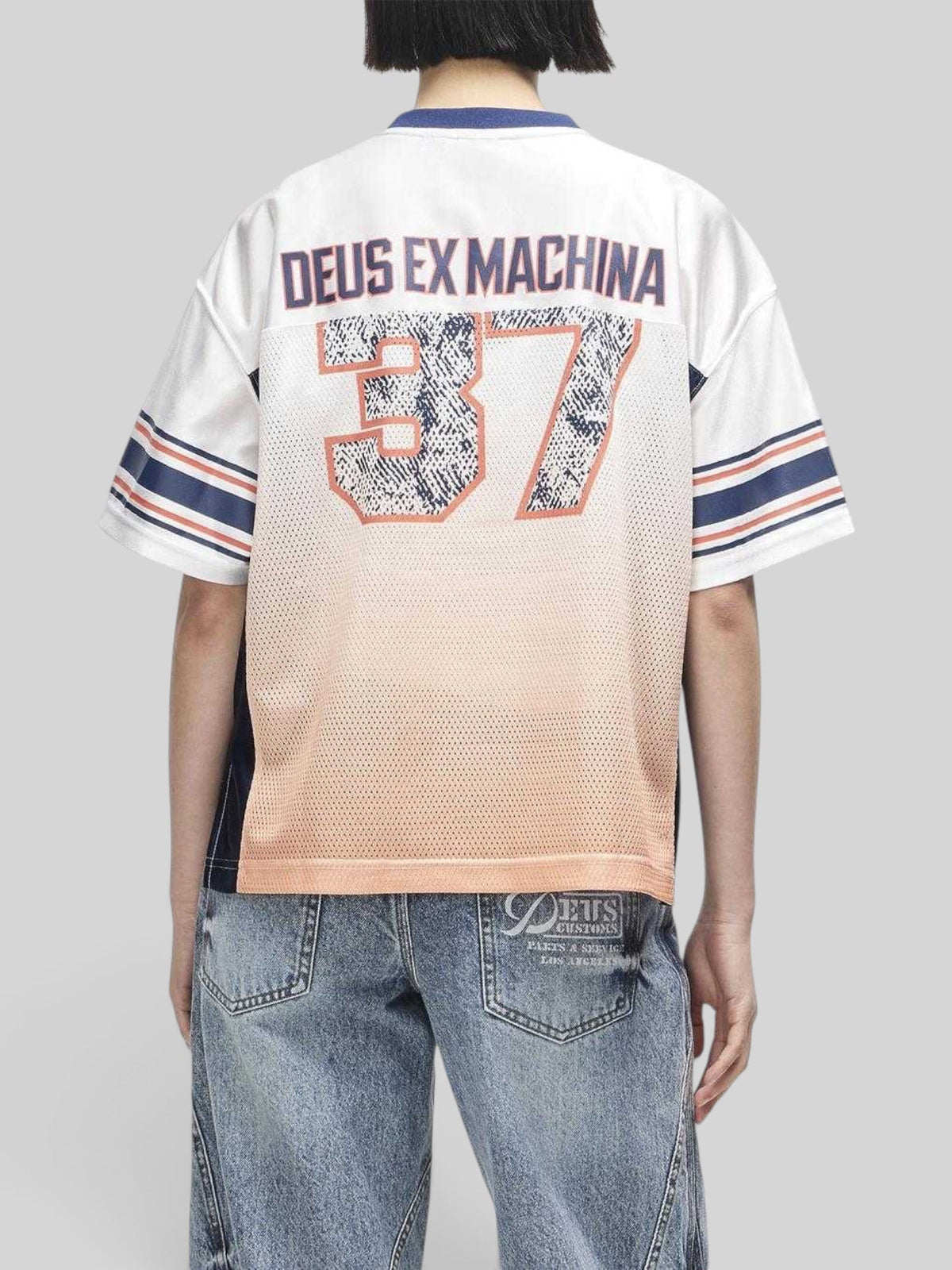 Baffle Haus San Remo #37 cropped mesh training top in white and flame orange with motorsport-inspired graphic print