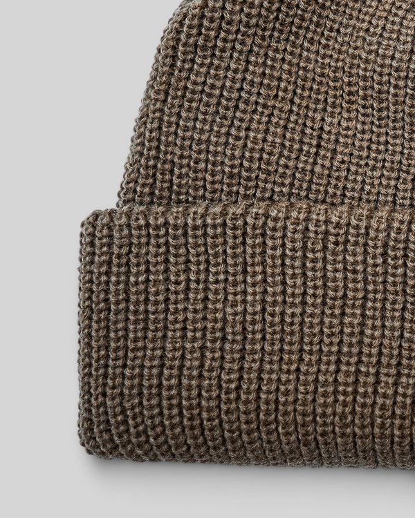 Baffle Haus sand coloured acrylic ribbed knit beanie with a classic cuffed design and woven brand label