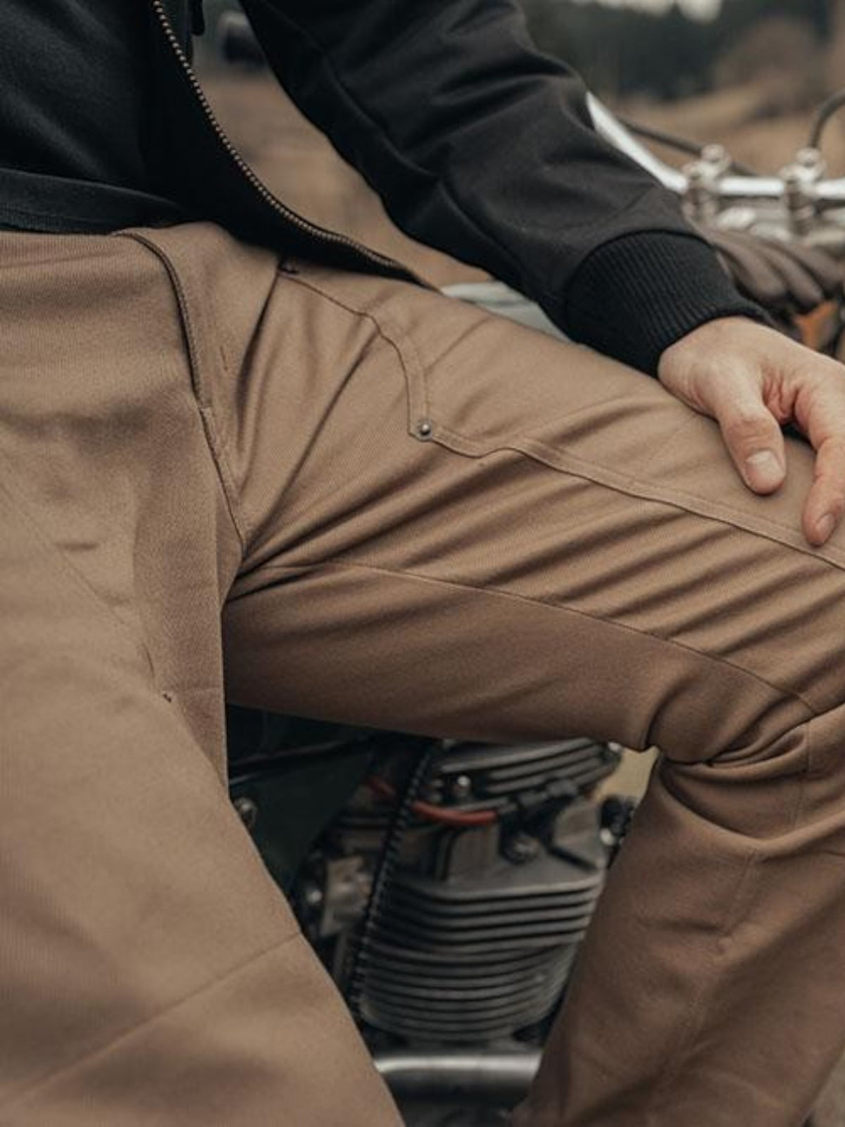 Baffle Haus Service Pants in desert khaki, a durable cotton-blend motorcycle trouser with a vintage carpenter style.