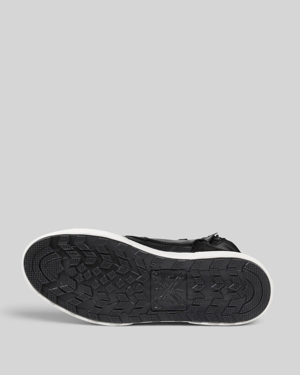 Baffle Haus Shifter motorcycle sneaker boot showing the black oil-resistant non-slip rubber sole with tread pattern