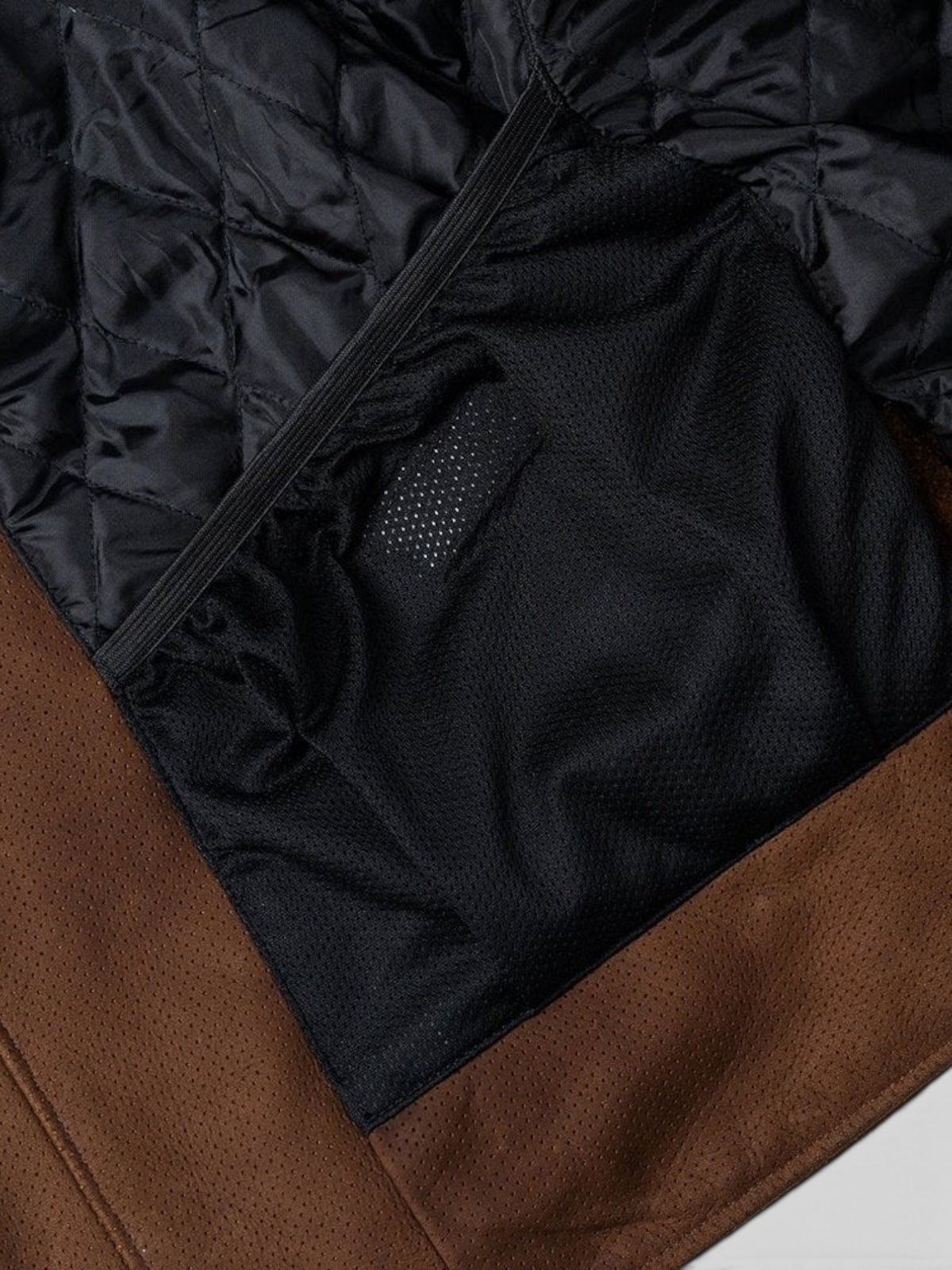 Baffle Haus Shogun mahogany nubuck leather jacket interior showing quilted lining and mesh storage pocket