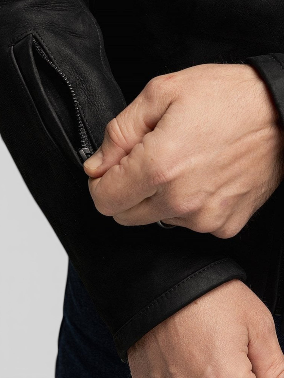 Baffle Haus Shōgun black nubuck leather motorcycle jacket sleeve detail with heavy-duty zipper and forearm pocket