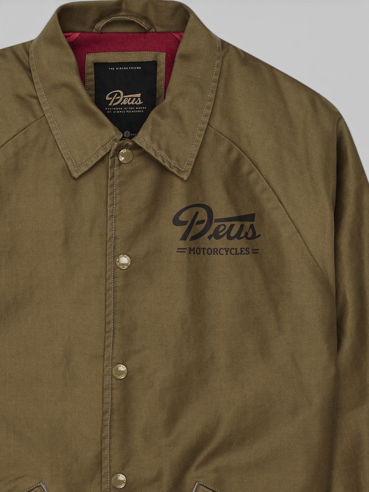 Baffle Haus Silos Mechanic Jacket in bronze brown cotton nylon sateen with snap buttons and chest logo detail