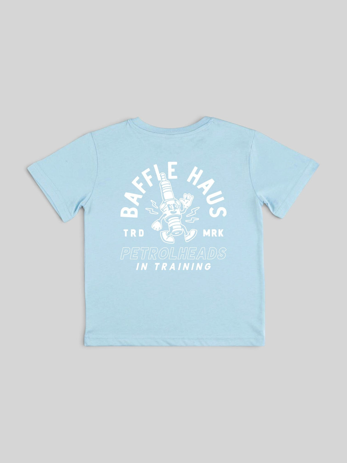 Back view of a sky blue Baffle Haus kids cotton t-shirt featuring a white graphic of Sparky the animated spark plug.