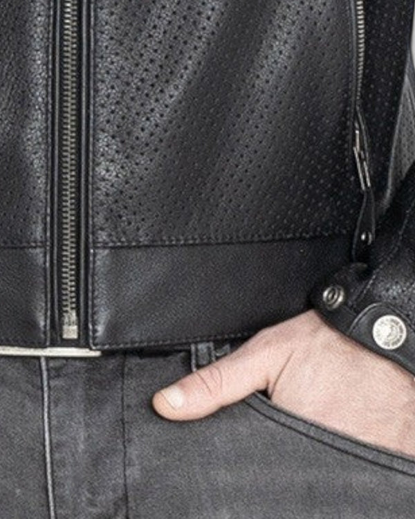 Close-up of Baffle Haus Storm black perforated leather motorcycle jacket with YKK zipper and press-stud cuff detail