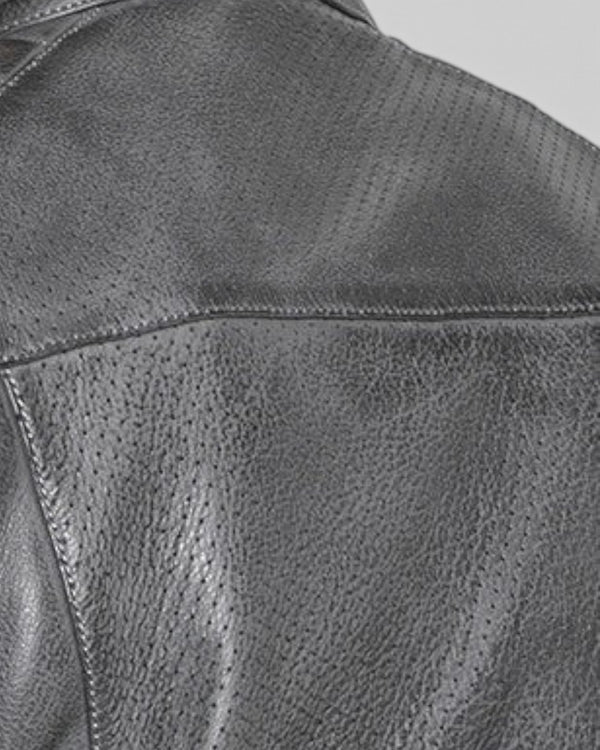Close-up of Baffle Haus Storm grey perforated leather motorcycle jacket showing textured grain and stitching detail
