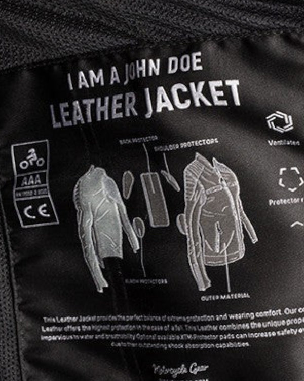 Baffle Haus John Doe Storm leather jacket interior label showing AAA safety certification and protector placement