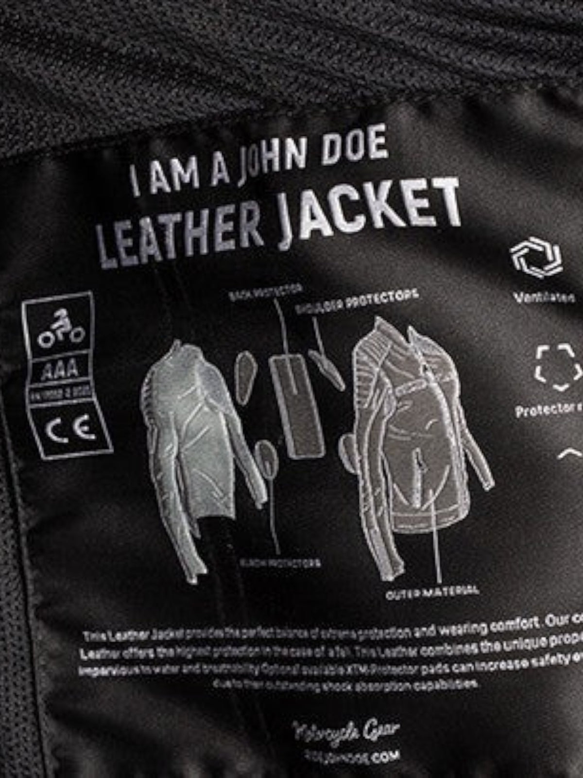 Baffle Haus John Doe Storm leather jacket interior label showing AAA safety certification and protector placement