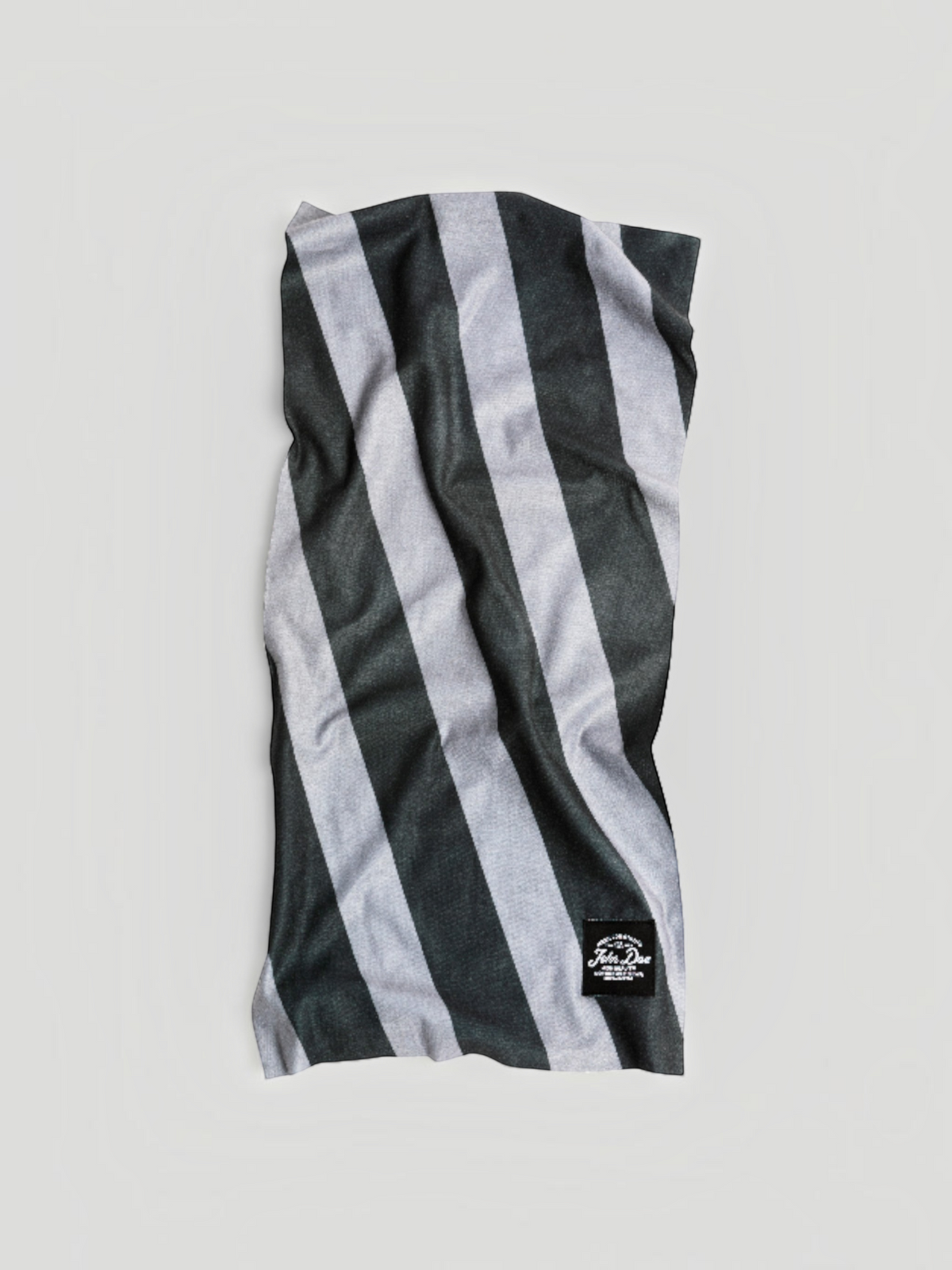 Baffle Haus black and grey striped seamless microfiber neck tube for sports and outdoor protection.
