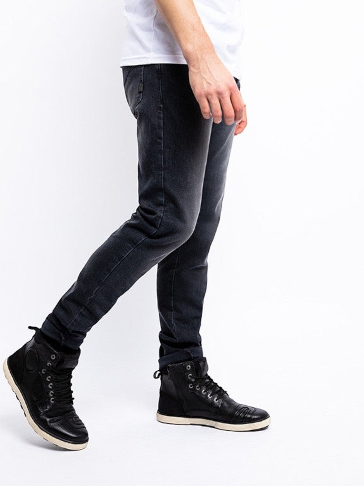 Baffle Haus Taylor black straight-fit motorcycle jeans with XTM-Fiber technology worn with black riding boots