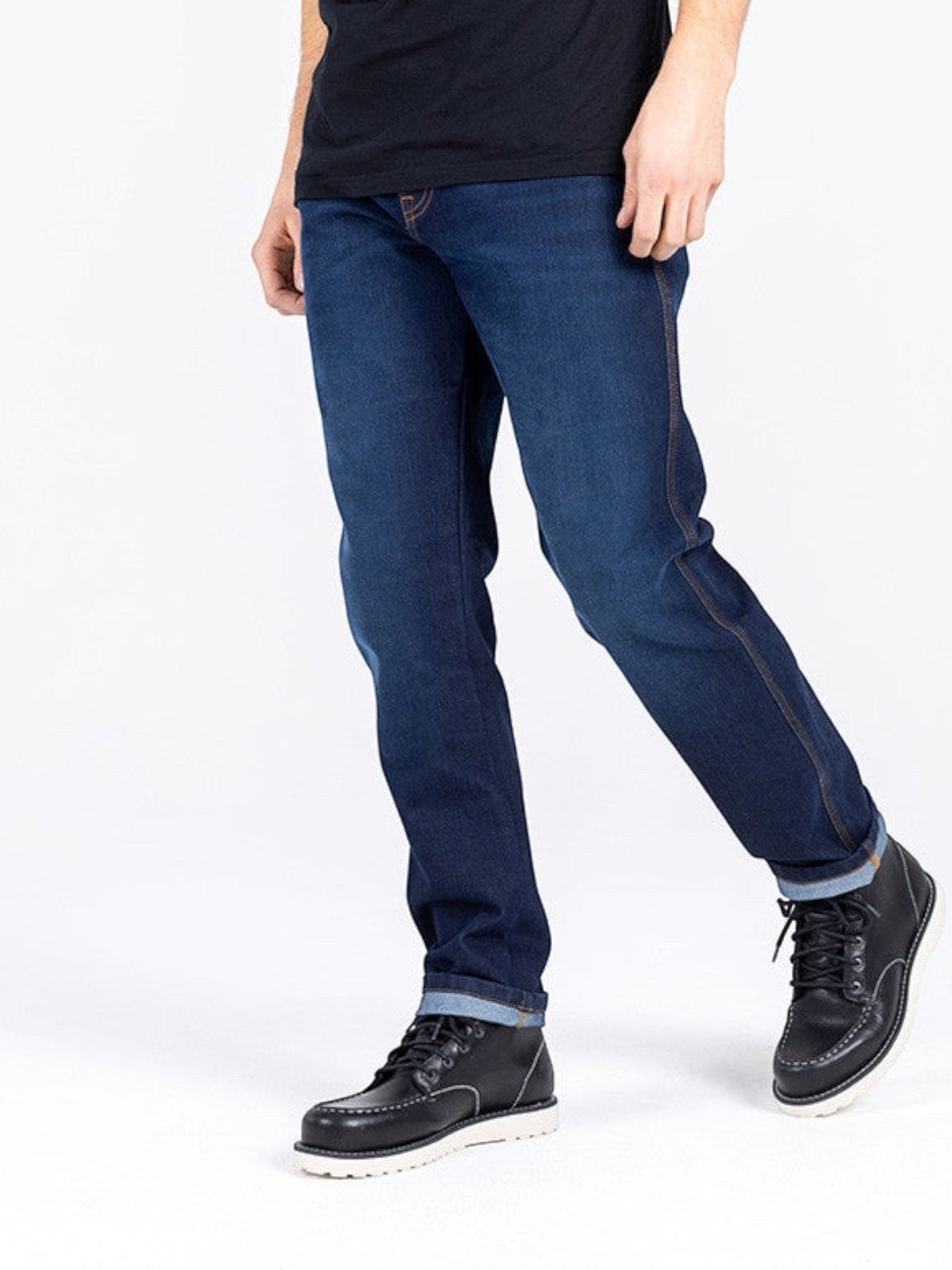 Baffle Haus Taylor dark blue motorcycle jeans with protective XTM-Fiber denim, straight fit, worn with black boots.