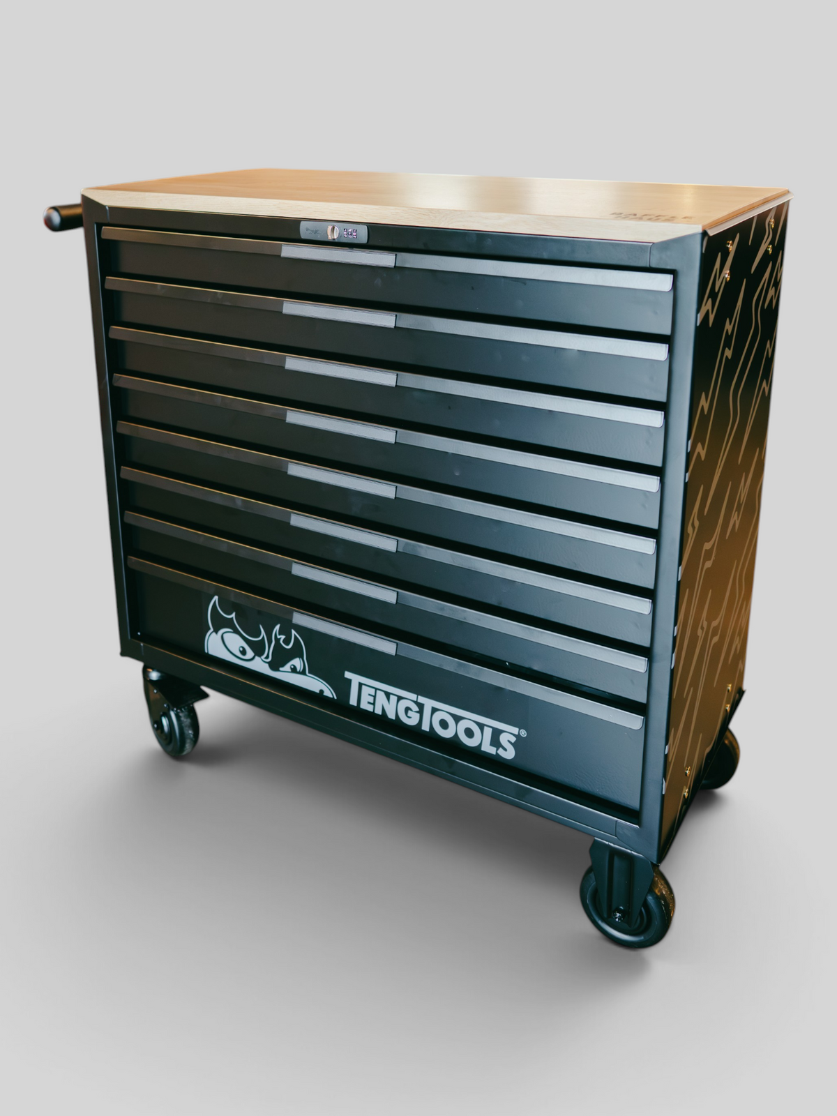 Baffle Haus Teng Tools black metal rolling tool chest with multiple drawers and white lightning bolt side graphics.