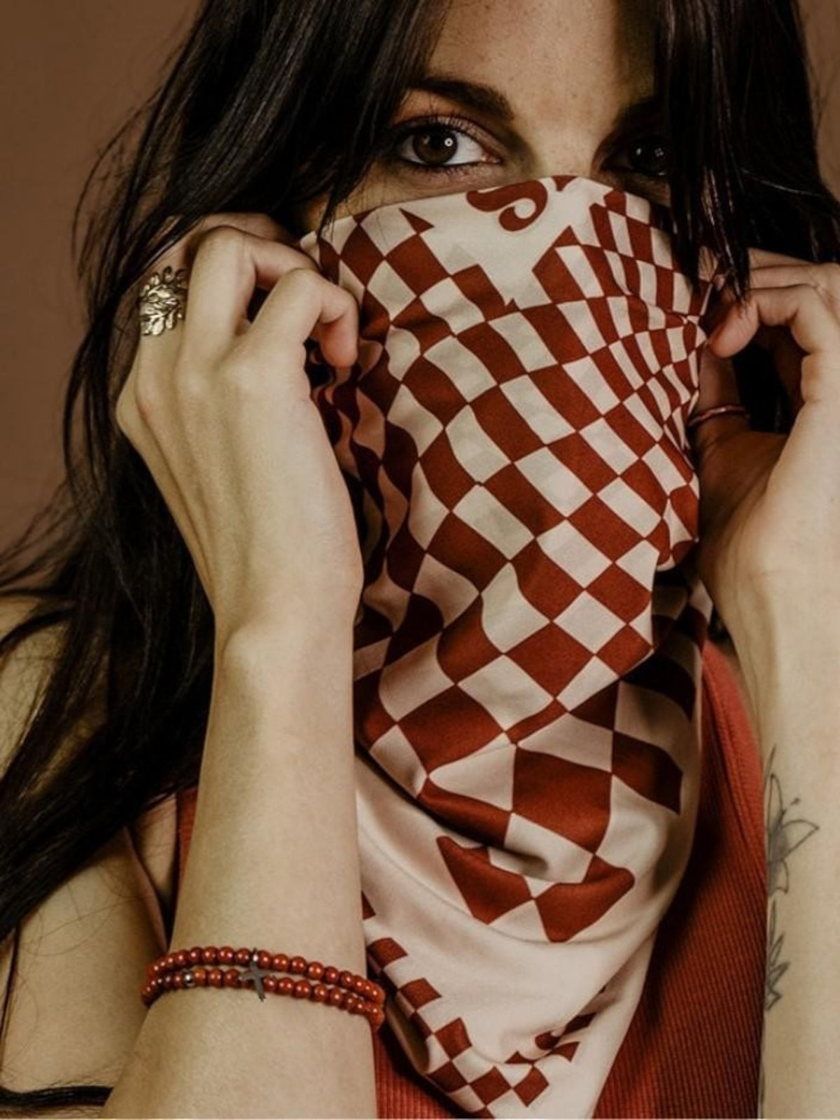 Baffle Haus Petrol Junkies scarf in terracotta and cream with a retro psychedelic checkerboard racing pattern