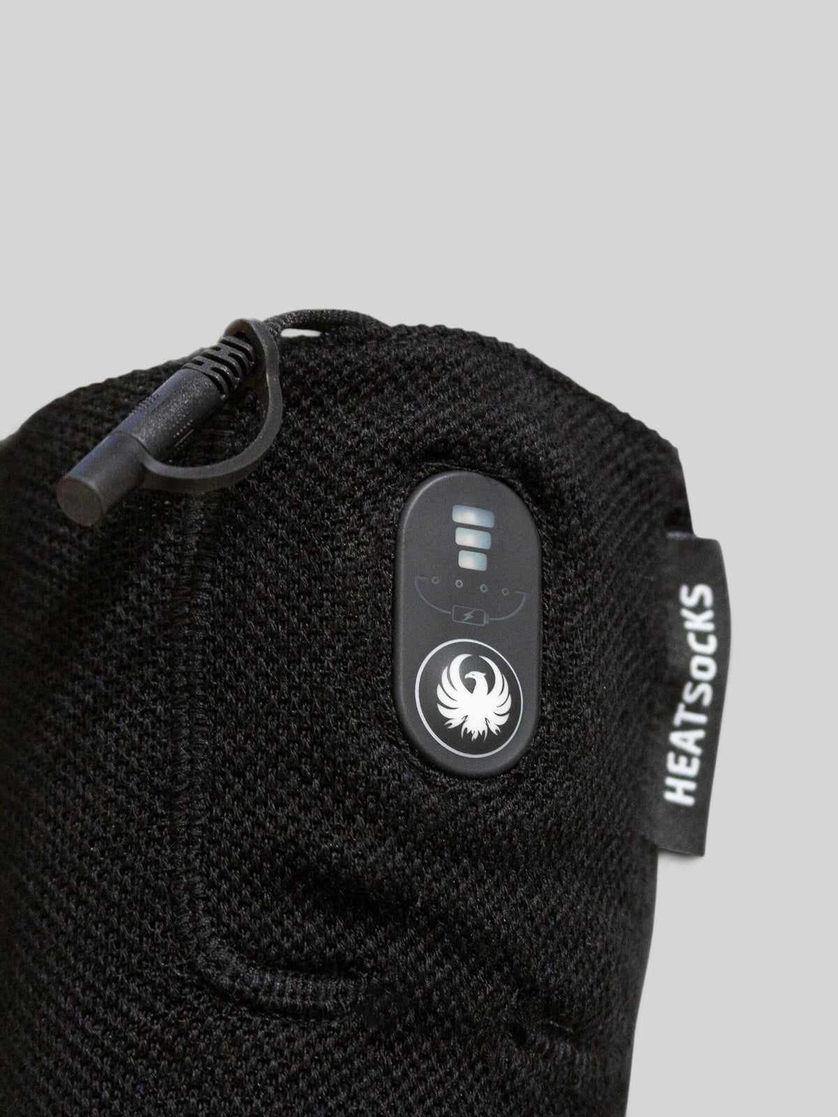 Baffle Haus Thermavolt heated socks in black with integrated power control unit and connector cable