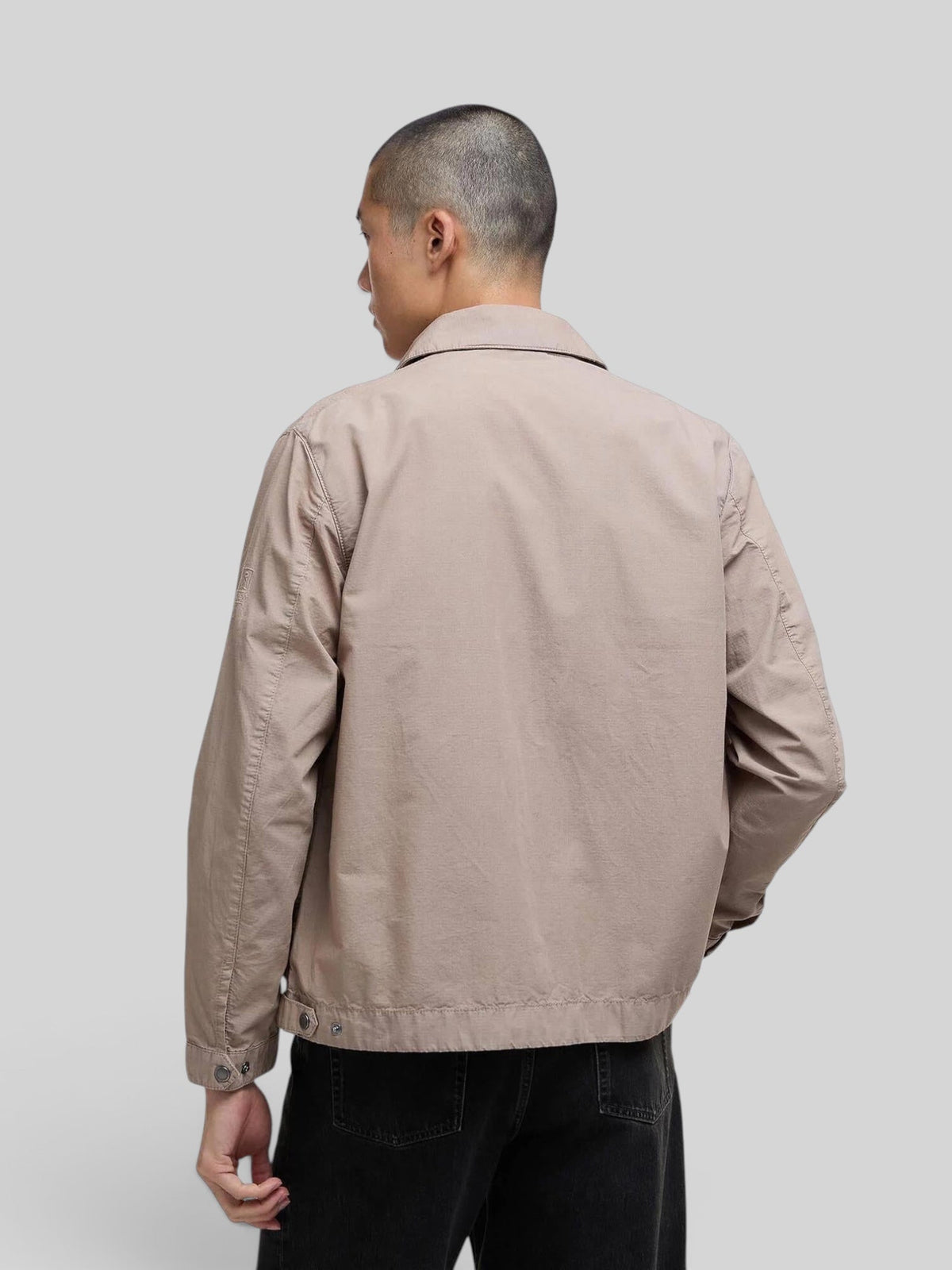 Baffle Haus Barbour International Workers Casual jacket in timberwolf beige, back view on a model
