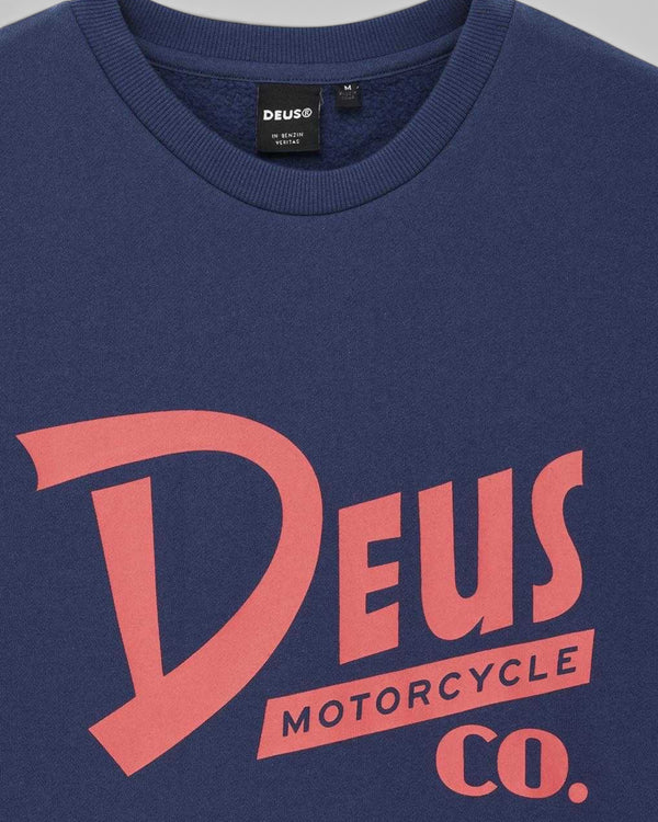 Baffle Haus Trafalgar crew fleece in mechanic blue organic cotton with red Deus Motorcycle Co. chest graphic