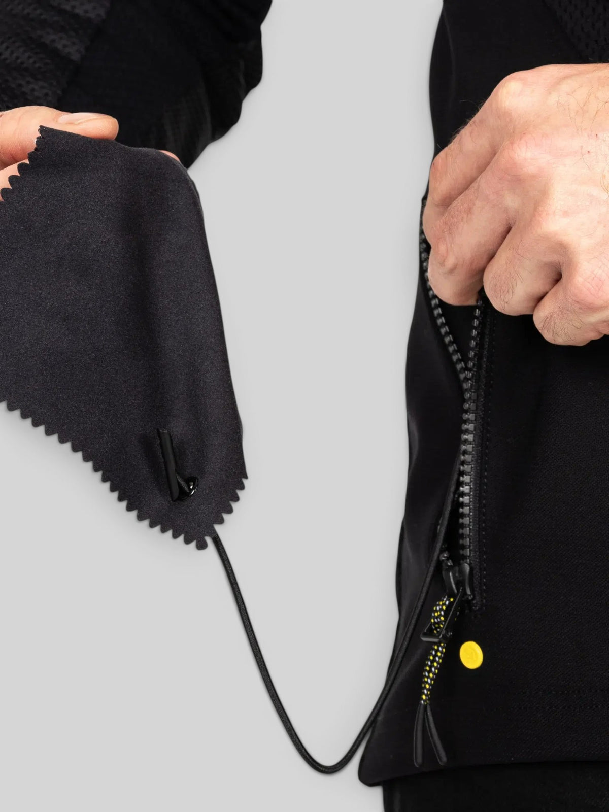 Baffle Haus Urbane Pro MK3 black motorcycle jacket detail showing the zipper and fabric texture