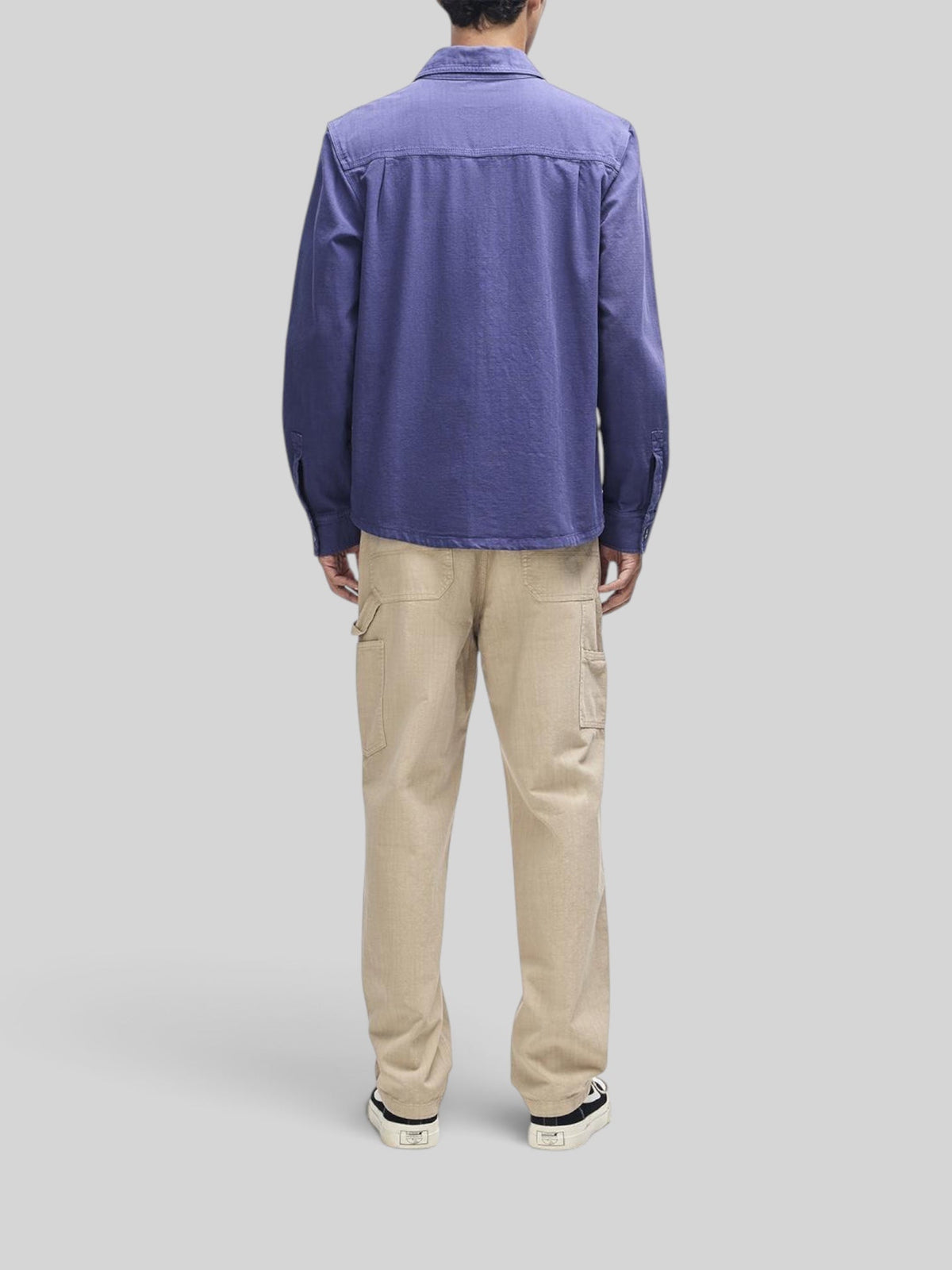 Baffle Haus Vacay Chambray Shirt in mechanic blue, relaxed fit long sleeve cotton overshirt, back view on a model