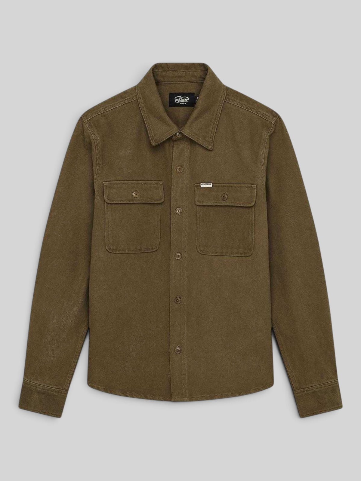 Baffle Haus Vacay Overdye Shirt in bronze brown cotton twill with dual chest pockets and corozo nut buttons.