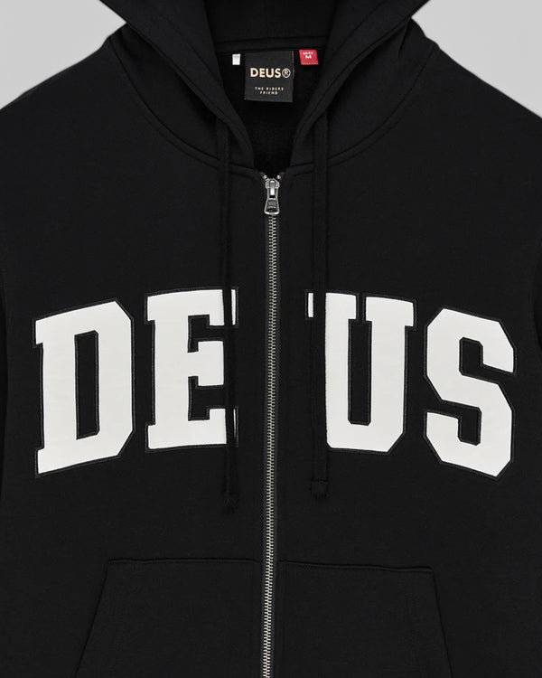 Baffle Haus Victory Lap black zip hoodie with white DEUS appliqué lettering on the chest and a drawstring hood.