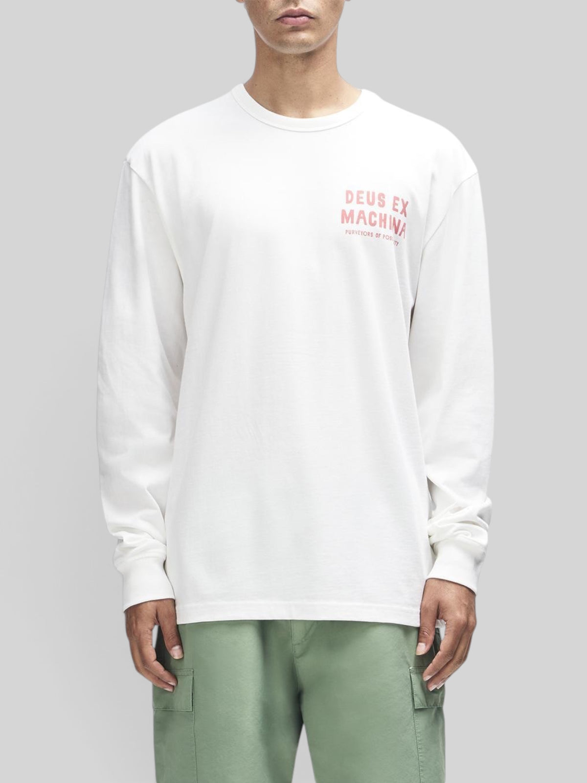 Baffle Haus Kumbaya long sleeve tee in vintage white with red chest graphic print on a model