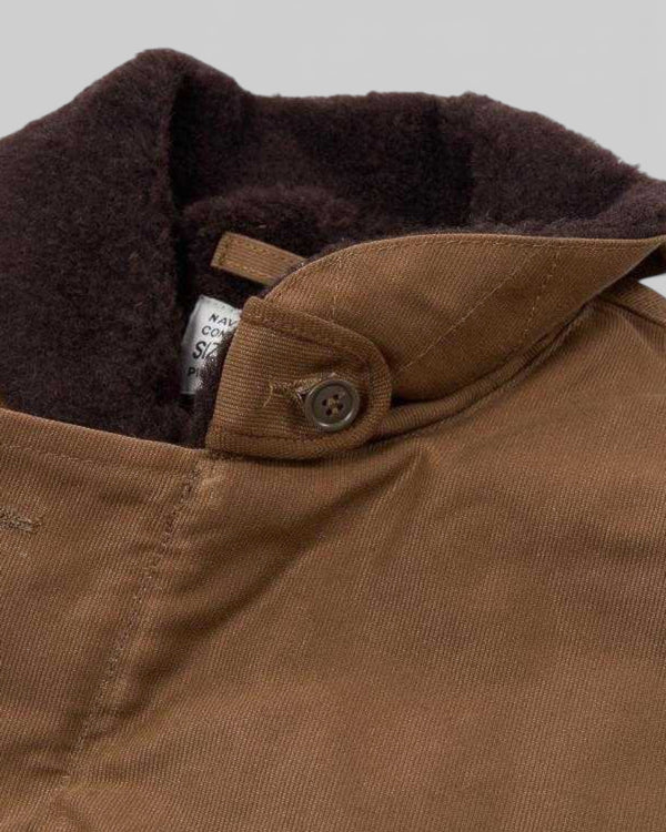 Baffle Haus 1944 N1 Deck Jacket in waxed khaki cotton with a dark brown wool collar and authentic spec label