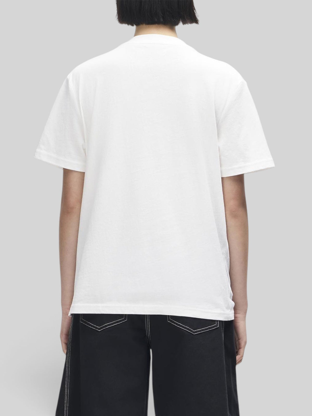 Baffle Haus A110 white lightweight recycled cotton blend t-shirt, back view on a model