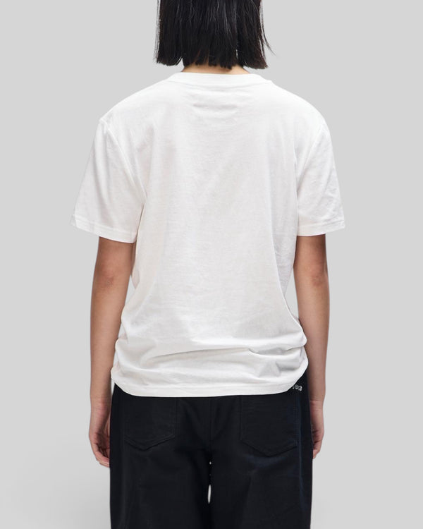 Baffle Haus white Ephemera graphic tee worn by a person, showing the plain back view of the recycled cotton shirt.