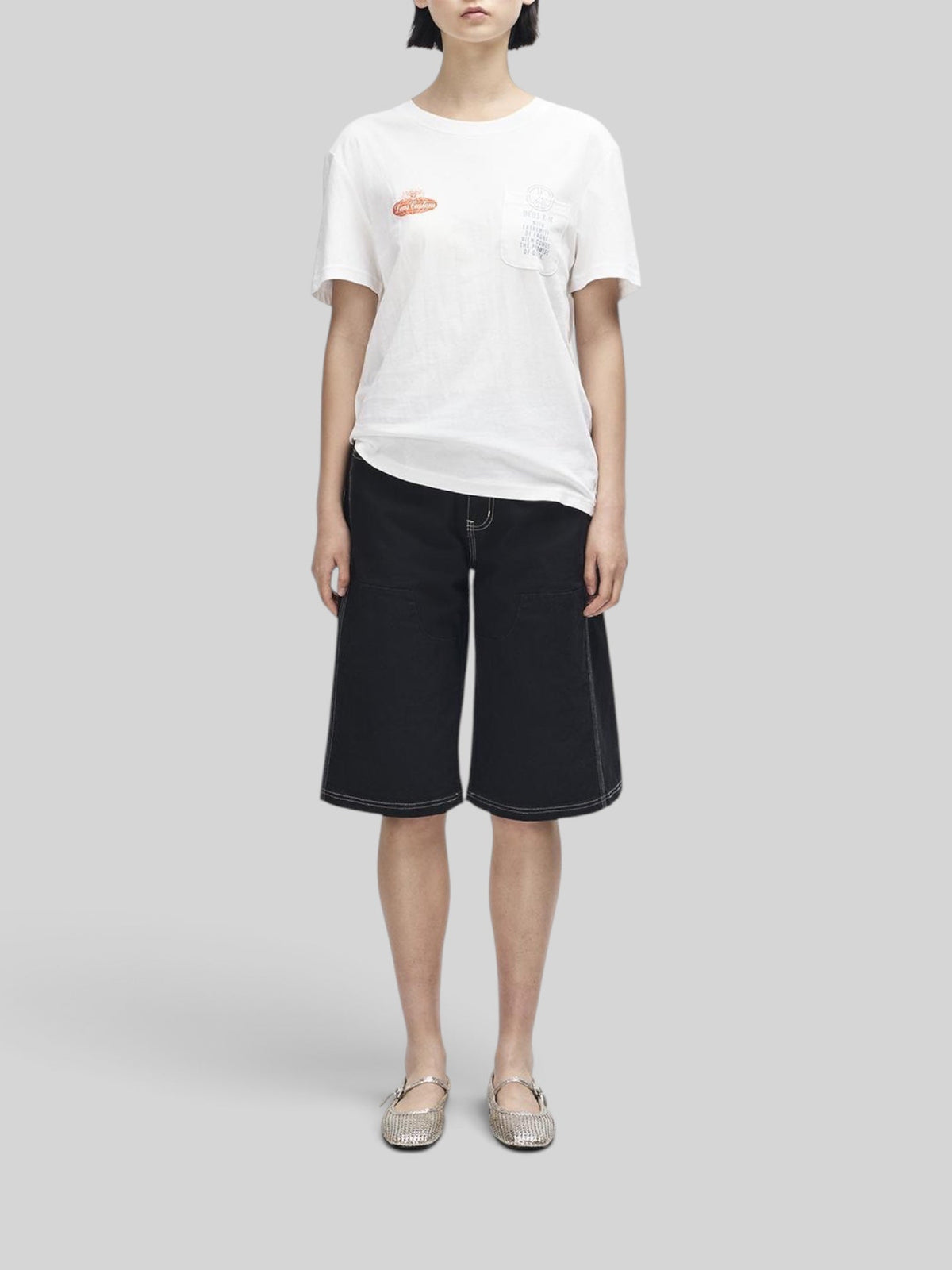 Baffle Haus white lightweight cotton blend tee with chest pocket and motorsport-inspired graphic print