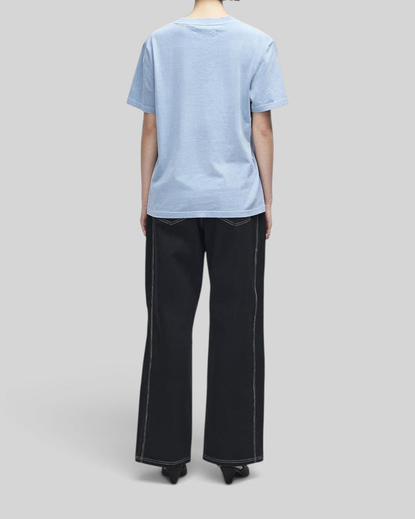 Baffle Haus A110 Tee in windward blue, a lightweight classic fit recycled cotton blend t-shirt, back view.