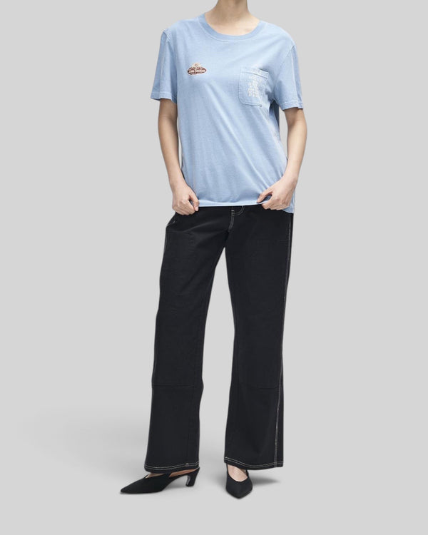 Baffle Haus A110 Tee in windward blue featuring a chest pocket with motorsport-inspired print and soft cotton blend.