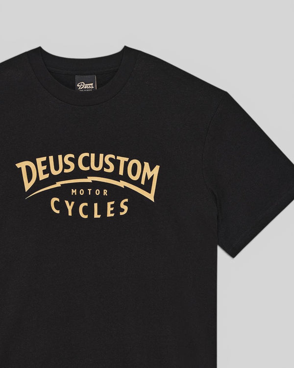 Baffle Haus Yesyes Tee in black featuring a vintage-style gold graphic print on the chest