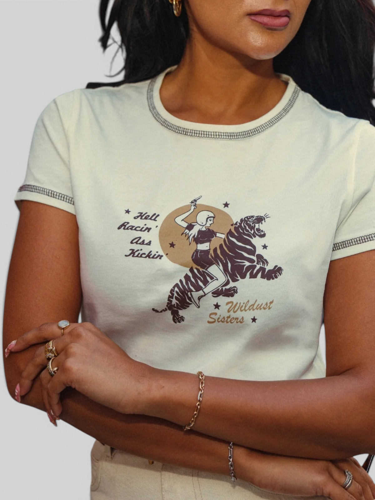 Baffle Haus white cropped cotton t-shirt with contrast topstitching and a tiger-riding female graphic print