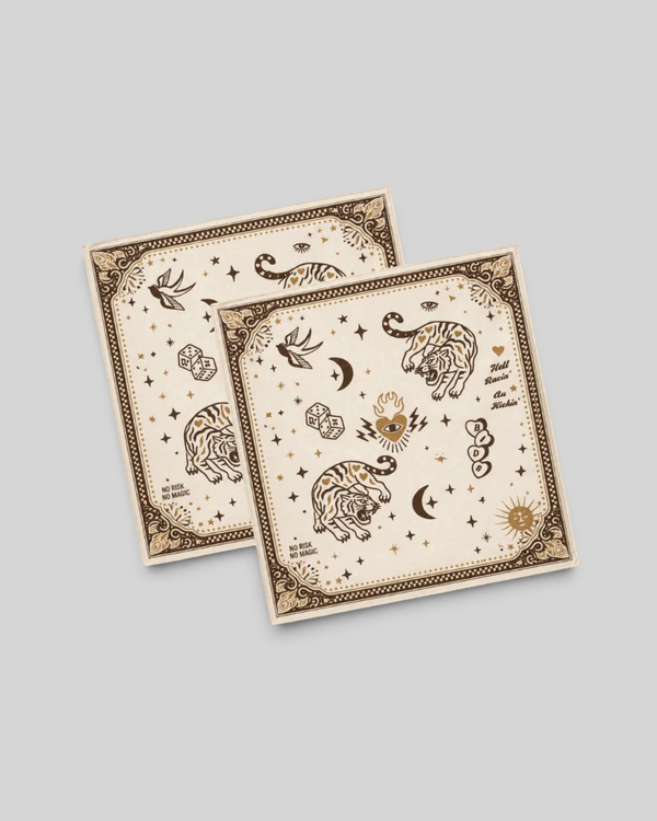 Baffle Haus beige lycra motorcycle scarf with brown tiger, celestial, and tattoo-inspired graphic prints.
