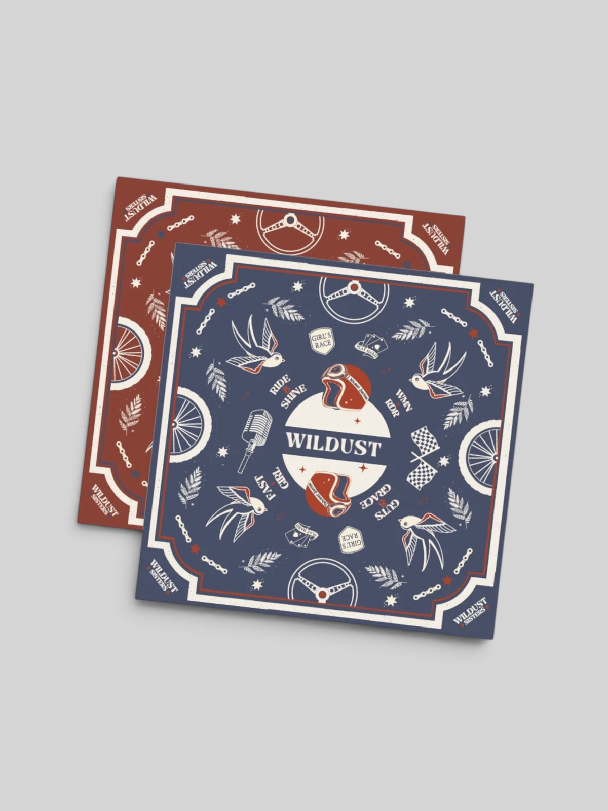 Baffle Haus Wildust Victory motorcycle scarf featuring retro racing graphics in blue and terracotta on stretch Lycra.