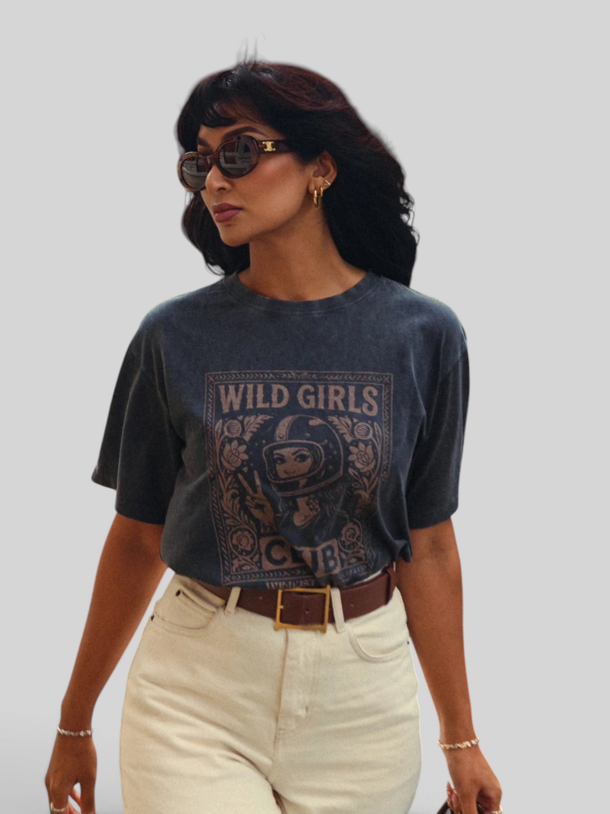 Baffle Haus Wild Girls Club grey washed cotton t-shirt with retro biker graphic print worn by a woman.