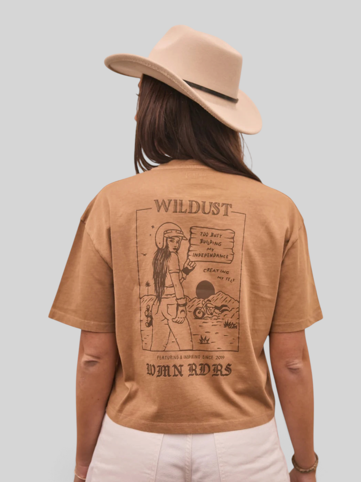 Baffle Haus khaki 100% cotton cropped T-shirt with a graphic print on the back featuring a woman and motorcycle